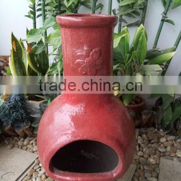 Sun Mexican clay chimenea in red