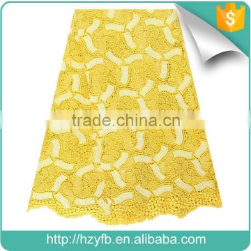2016 African water soluble cord lace fabric stock yellow wedding dress fabric                        
                                                                                Supplier's Choice