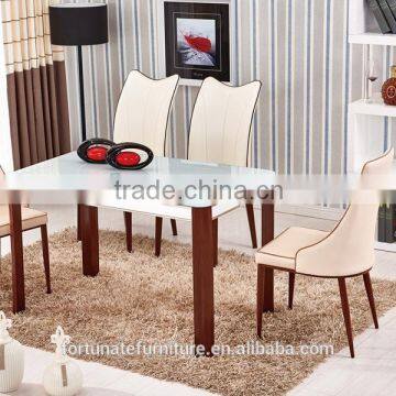 glass top wooden color steel leg dining table with tempered glass top