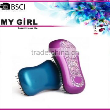 My girl hot new product Hair Tamer Turquoise Detangling Hair Brush Teezer
