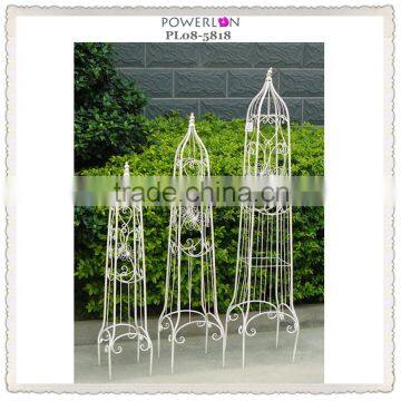 wrought iron obelisk for flower to climbe in garden