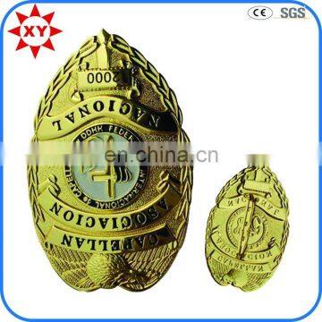 Factory price custom novelty badges gold dealer