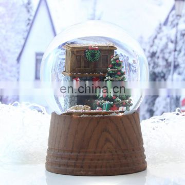 resin and glass souvenir gift tree snow globe