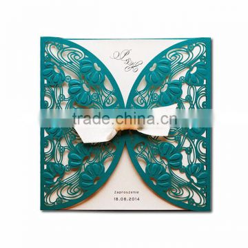 Unique & charming turquoise laser cut patterns and embossed accents wedding invitation with ivory ribbons