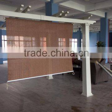 Outdoor blinds with HDPE fabric and spring loading