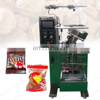 Automatic vertical compressed candy sterilized tablets round ball counting packing machine