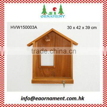 Wooden house shape with hook wall decoration in home decor