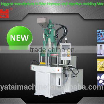 Small size vertical injection machine