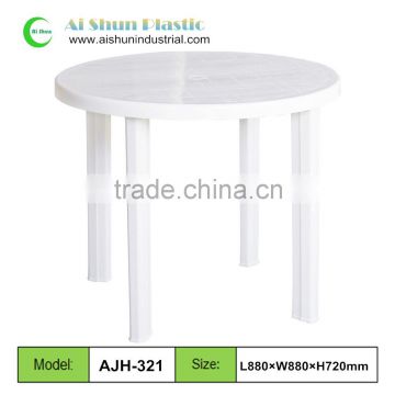 Round plastic restaurant table and chairs
