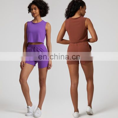 Wholesale Nude Breathable Sleeveless Crop Tank Top Loose Casual Elastic Pocket 2 Piece Sports Gym Yoga Set Women Fitness Wear