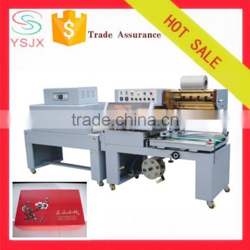 Automatic heat stretch film shrinking packing machine plastic wrapping machine
