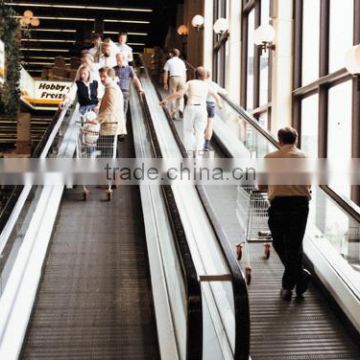 Moving sidewalk escalator in mall