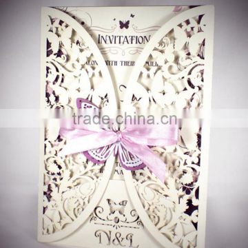 Romantic ivory laser cut cheap wedding invitation card with pink ribbons