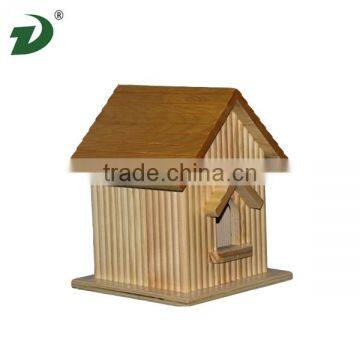 A large wooden house is suitable for a cat and dog house