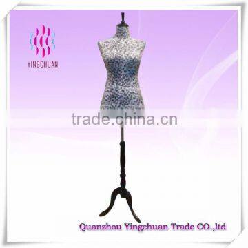 Leopard-spotted female dress form mannequin