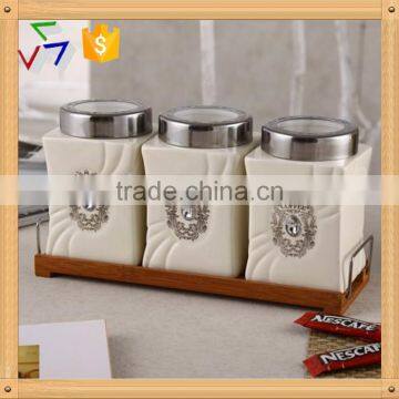 ceramic canister set with stainless lid & wooden stand