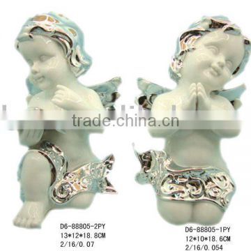 Porcelain cherub statue