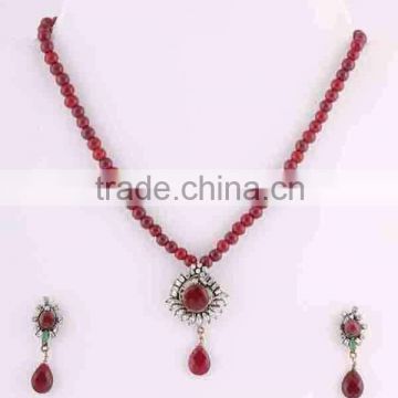 Jaipuri manufacturers ruby pendant necklace earrings set fashion dress jewelry. Brass metal.