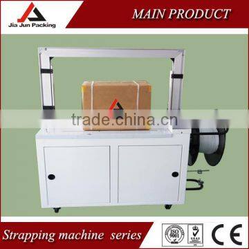 automatic carton sealing and strapping machine