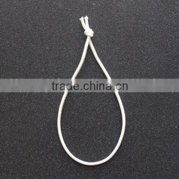 white elastic cord with knot for tag