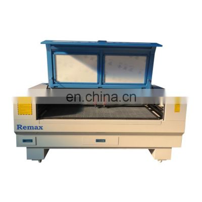China auto feed laser cutting machine co2 double head from jinan