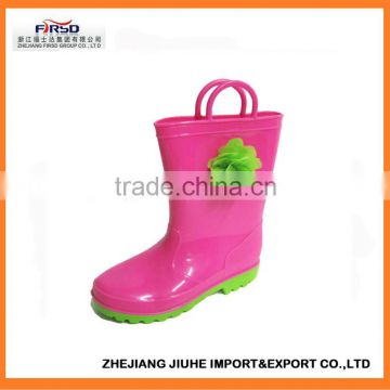 2014 fashion cute kids' pvc boots with handle design