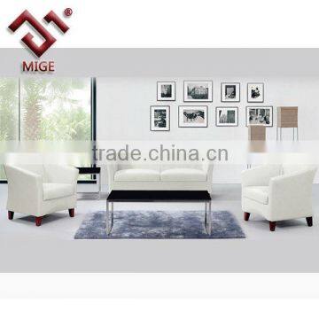 White office sofa with wooden legs