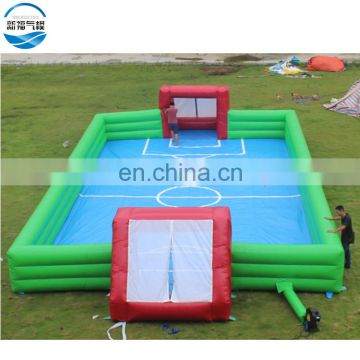 Giant inflatable shooting football pitch game,factory price inflatable soap football field for adults
