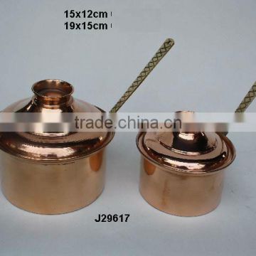 Copper saucepan with pewter lining and brass handles and polished