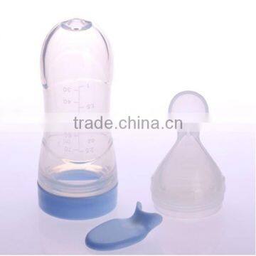 100%BPA free silicone squeezing feeder spoon baby silicone squeeze feeder