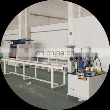 Knurling and strip feeding machine for aluminum window and door