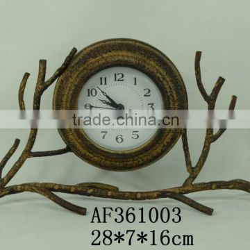 metal table clock with bird and branch