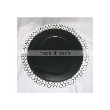 Black charger plate with white crystal for wedding