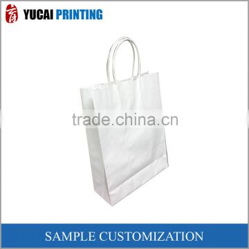 The white paper bag can be customized gift bag shopping bag