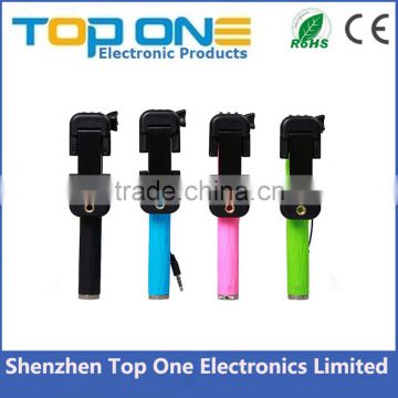 Factory wholesale pocket mini size colorful extendable handheld selfie stick with cable for iPhone and Samsung
