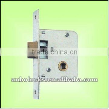 white lock with brass latch bolt