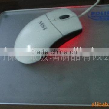 clear glass mouse mat