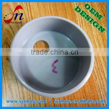Precise injected cap with drain hole