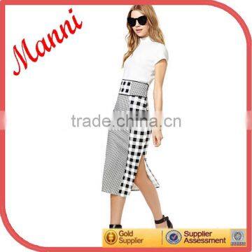 Manni Contrasting Gingham prints Skirts in a panel design wide waist band for an ultra flattering fit and sexy side slit