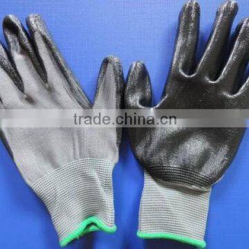 Grey Polyester knitted gloves with Nitrile coated on palm,13 gauge