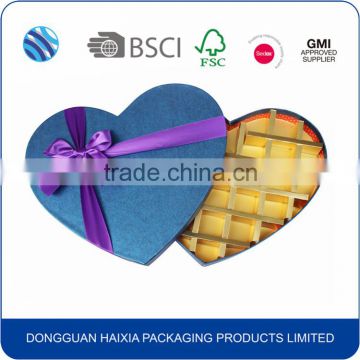 Colorful paper heart shape chocolate packaging box with ribbon