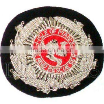 Isle of Man Fire And Rescue Service cap badge