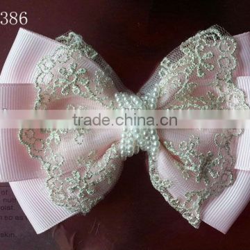 CF0386 2013 New arrival beautiul wholesale pearl center hair bows for babies
