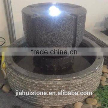 small illuminated indoor stone water features