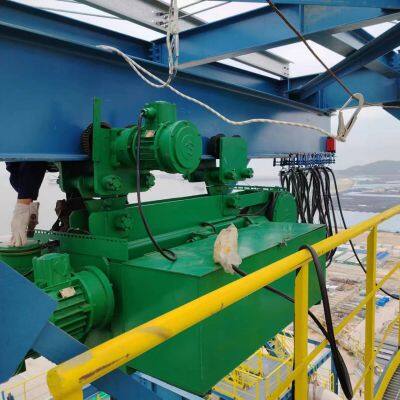 Explosion proof electric hoist with curved rail on top of LNG storage tank