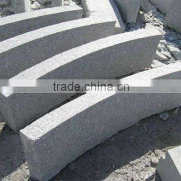 curved grey granite kerbstone curbstone