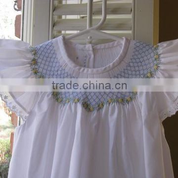 wholesale Blue smocked dress with hand smocked geometric pattern