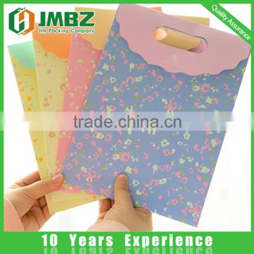 Foldable,Recyclable,recyclable Feature and Hand Length Handle Sealing & Handle die cut paper bag