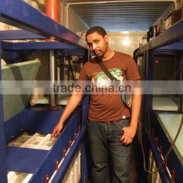 Containerized industrial ice block making machine