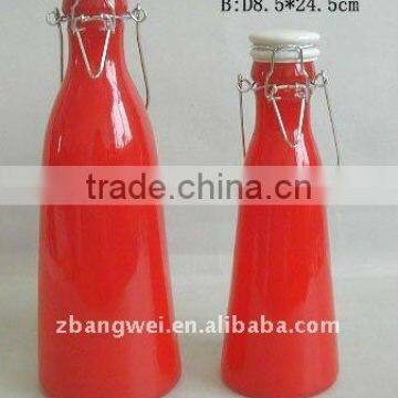 2 sizes glass bottle with sprayed red color